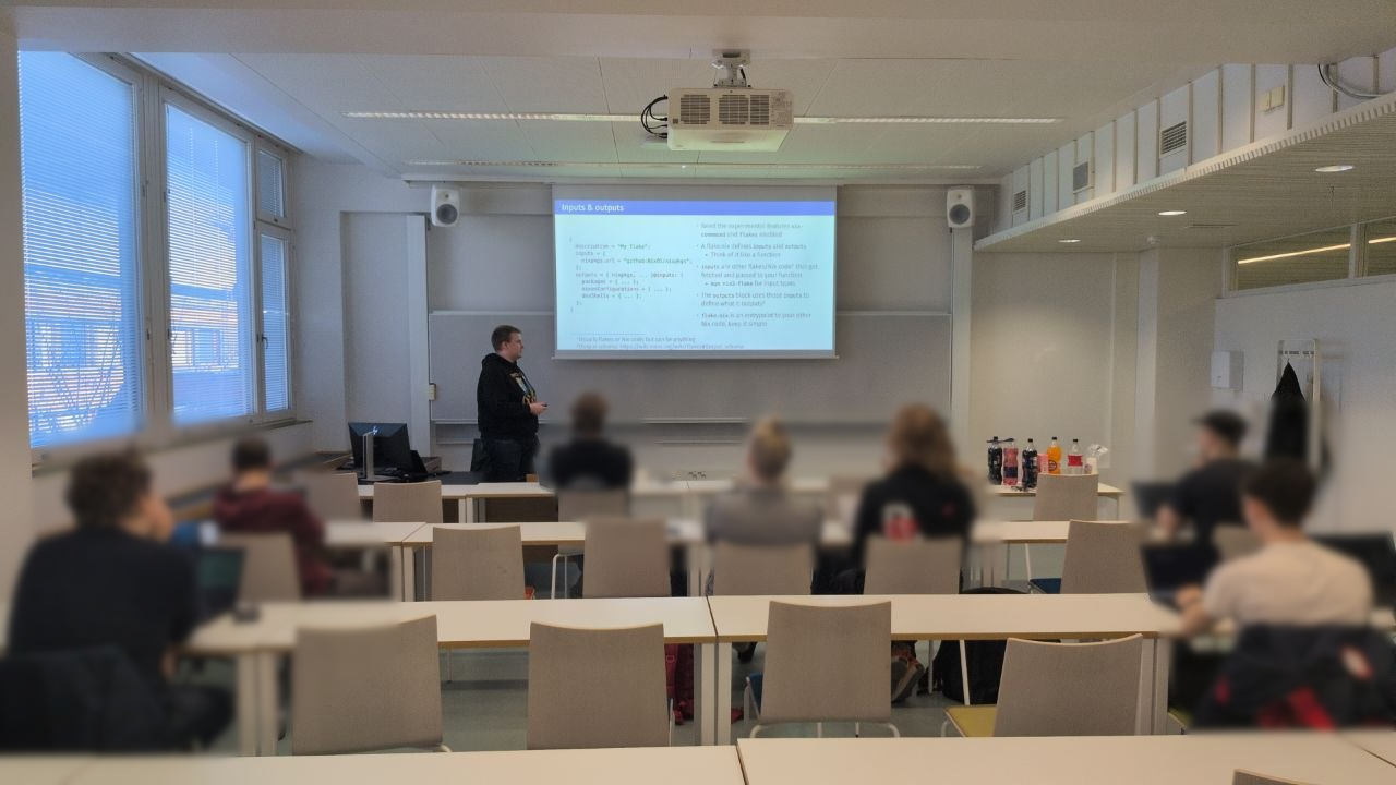 The audience listining to Roy's presentation